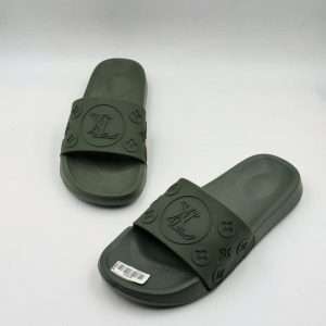 Louis Vuitton Waterfront Mule slides, featuring an embossed Monogram pattern on flexible rubber.